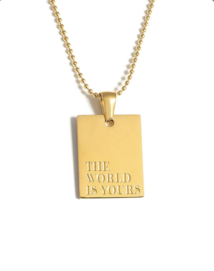 Μενταγιόν με μήνυμα – THE WORLD IS YOURS